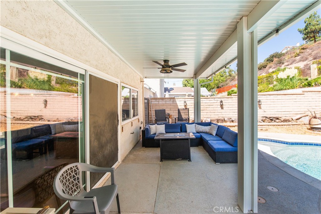 29262 Florabunda Road Canyon Country, CA 91387 - Photo 21 of 27 a living room with furniture floor to ceiling window and outdoor view