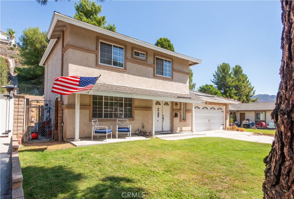 29262 Florabunda Road Canyon Country, CA 91387 - Photo 24 of 27 a view of an house with backyard porch and patio