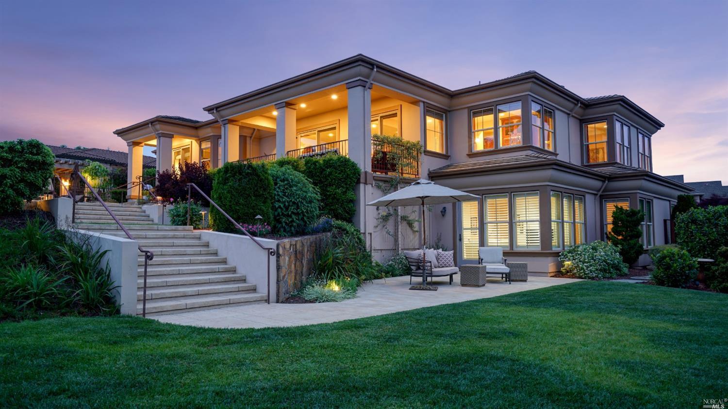29 Wallenberg Way Petaluma, CA 94952 - Photo 1 of 1 a front view of a house with garden and sitting area