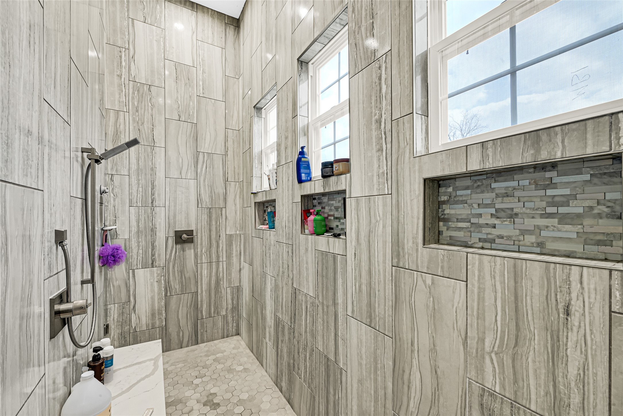 4821 1st Street Houston, TX 77504 - Photo 15 of 48 a view of a bathroom with a shower