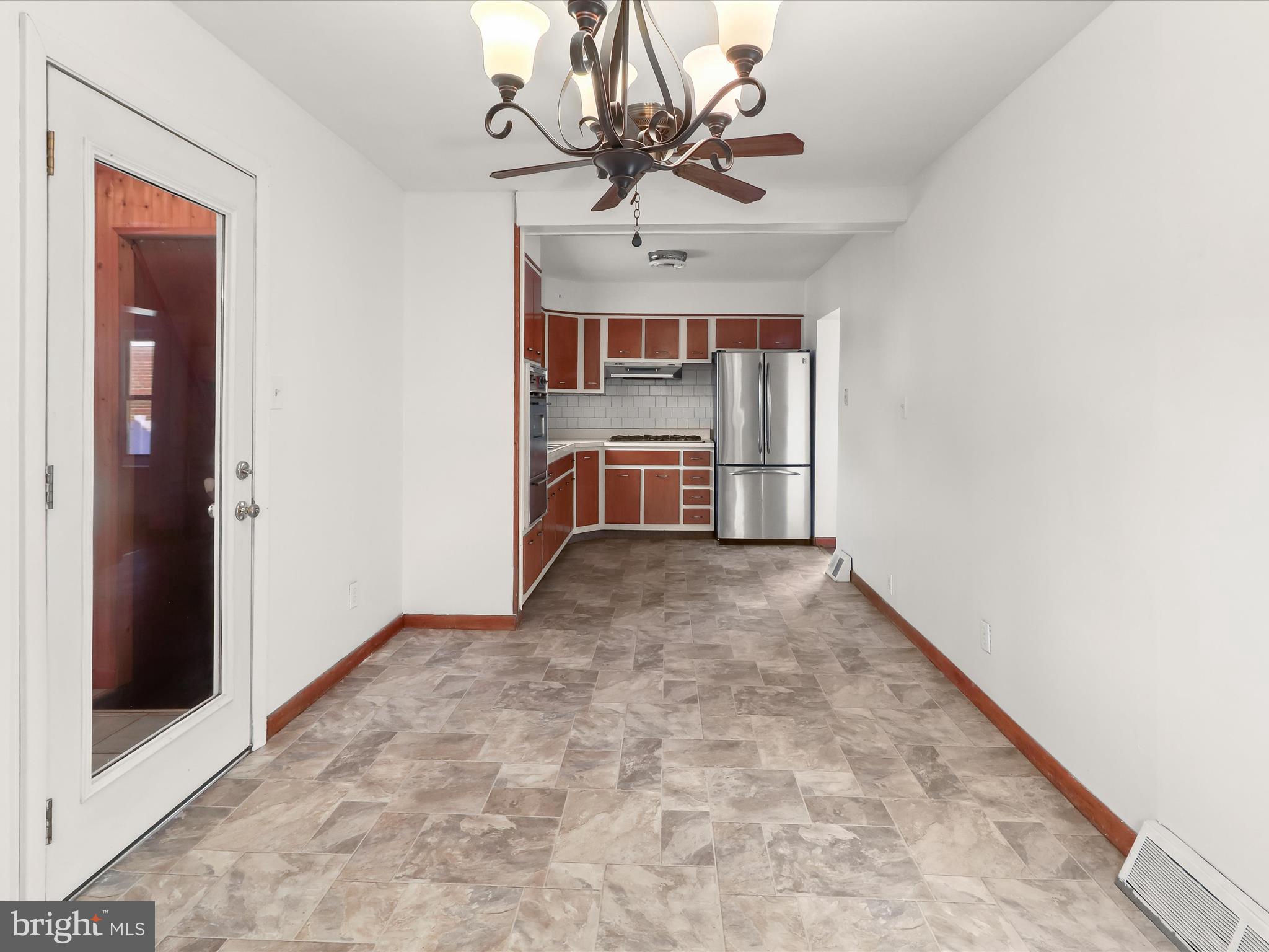 213 Ashwood Road Baltimore, MD 21222 - Photo 14 of 29 Breakfast Room and Kitchen