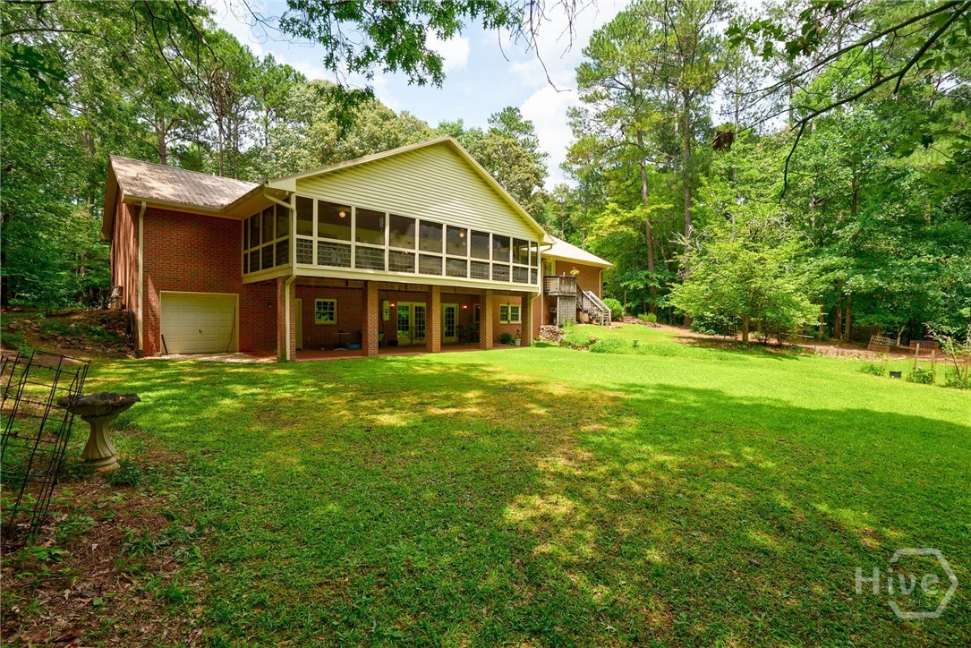 1348 Barwick Hill Road Comer, GA 30629 - Photo 17 of 40 Large screened porch on custom built home