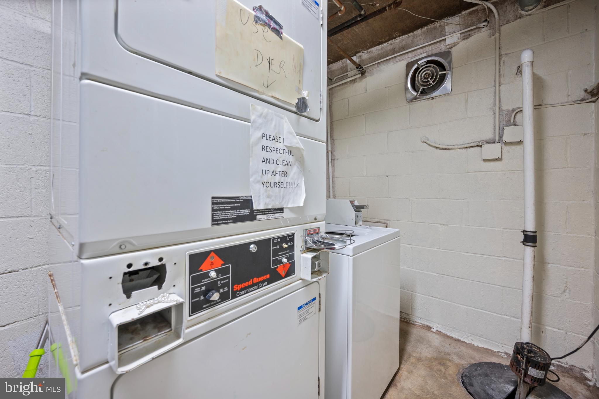 6511 Parsons Avenue Baltimore, MD 21215 - Photo 24 of 25 a utility room with dryer and washer
