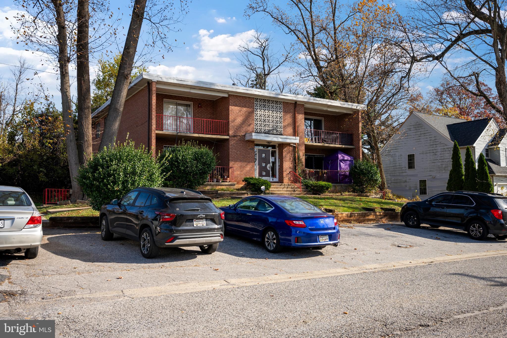 6511 Parsons Avenue Baltimore, MD 21215 - Photo 25 of 25 a car parked in front of a houses
