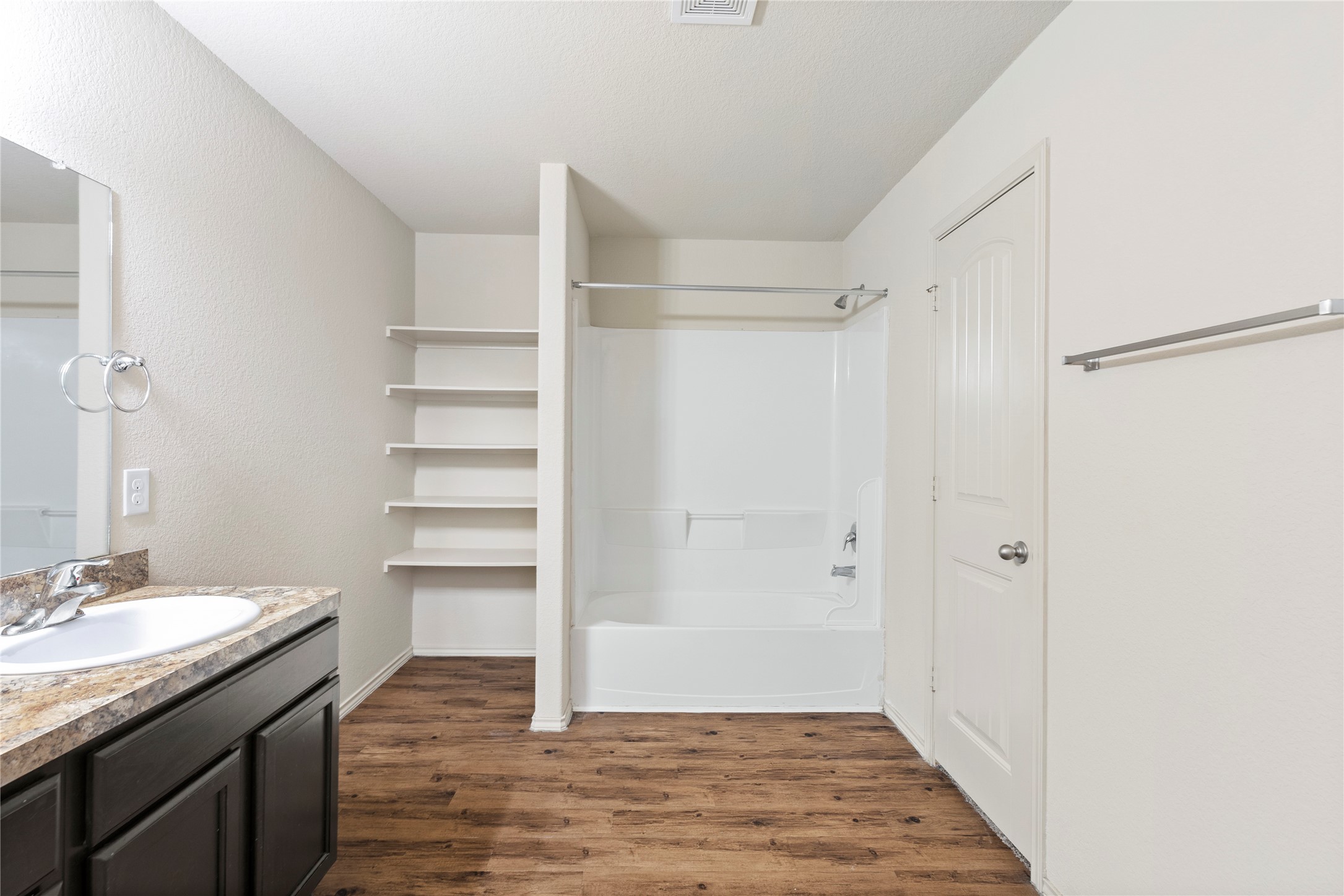 24407 Pigeon Berry Drive Spring, TX 77373 - Photo 21 of 34 a bathroom with a granite countertop sink shower and a mirror