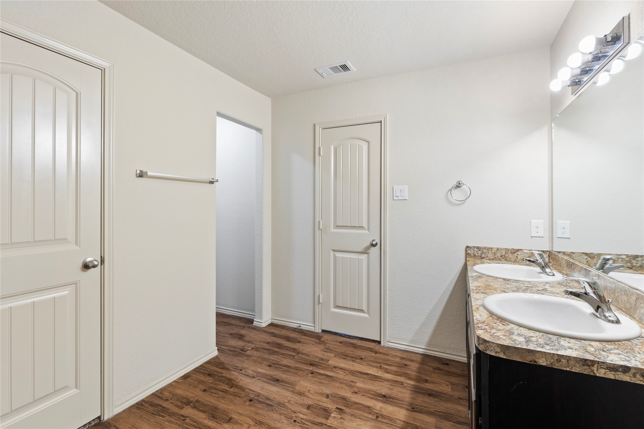 24407 Pigeon Berry Drive Spring, TX 77373 - Photo 22 of 34 a bathroom with a granite countertop sink and a mirror