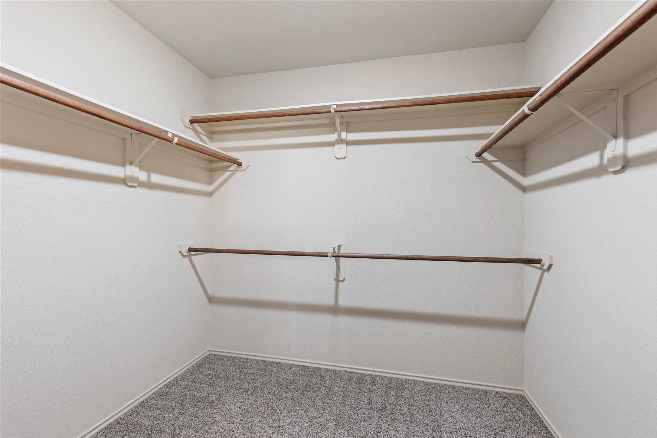 24407 Pigeon Berry Drive Spring, TX 77373 - Photo 24 of 34 a view of an empty walk in closet