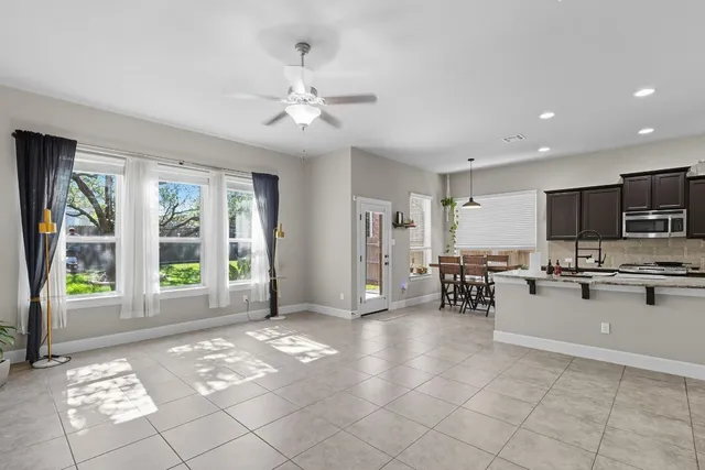 a view of a livingroom with furniture and window