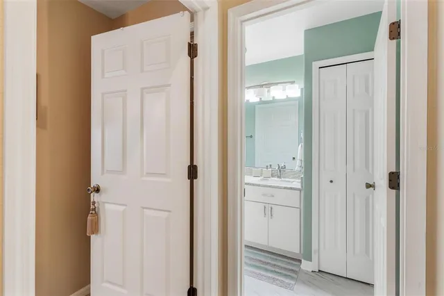 a bathroom with a bathtub and a sink