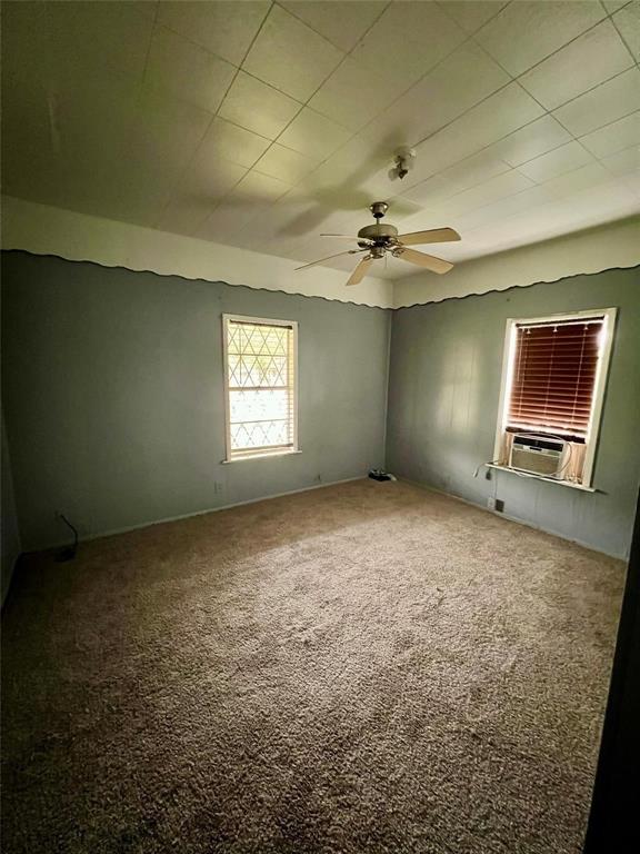 1803 Franklin Street, Unit 1 Bonham, TX 75418 - Photo 2 of 5 a view of an empty room with a window
