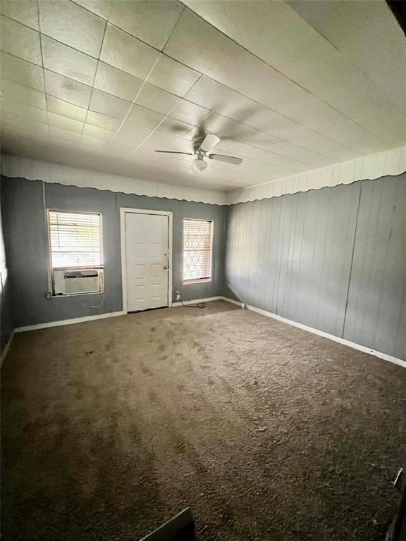 1803 Franklin Street, Unit 1 Bonham, TX 75418 - Photo 4 of 5 a view of an empty room with a window