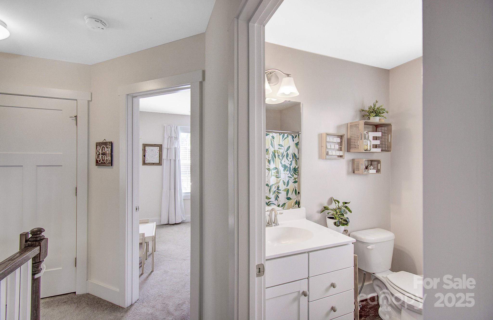 689 Cardwell Lane Fletcher, NC 28732 - Photo 18 of 39 a bathroom with a sink toilet and shower