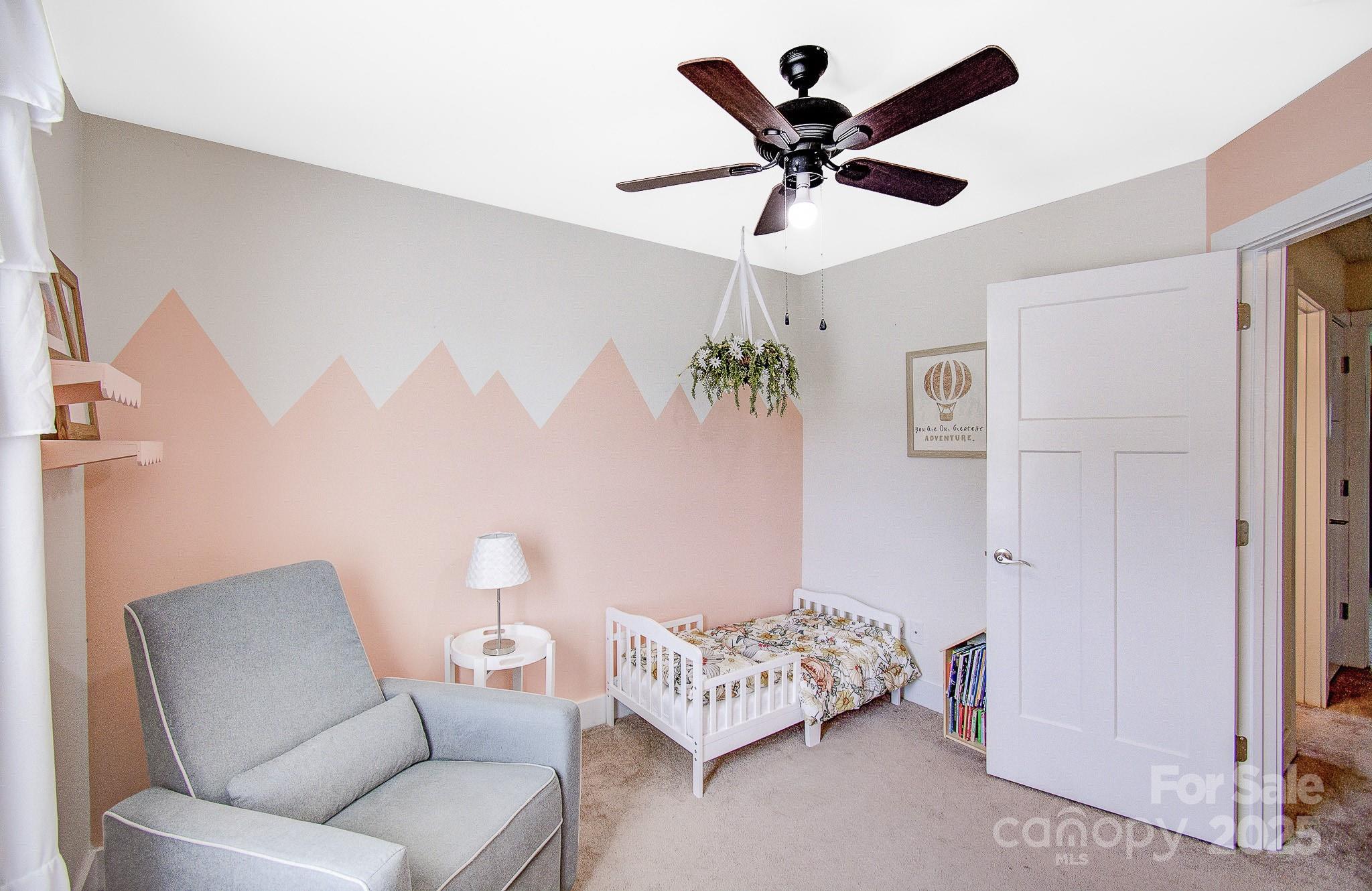 689 Cardwell Lane Fletcher, NC 28732 - Photo 28 of 39 a living room with furniture and a ceiling fan