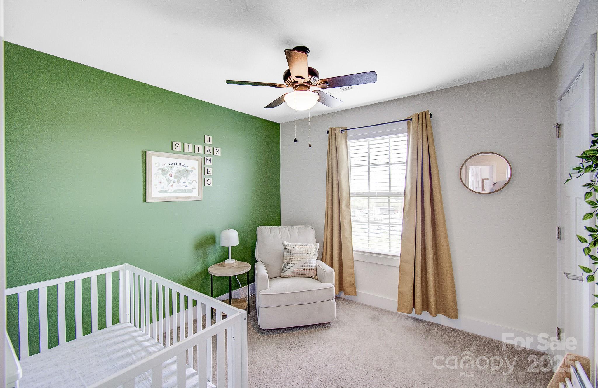689 Cardwell Lane Fletcher, NC 28732 - Photo 29 of 39 a bedroom with a bed and window