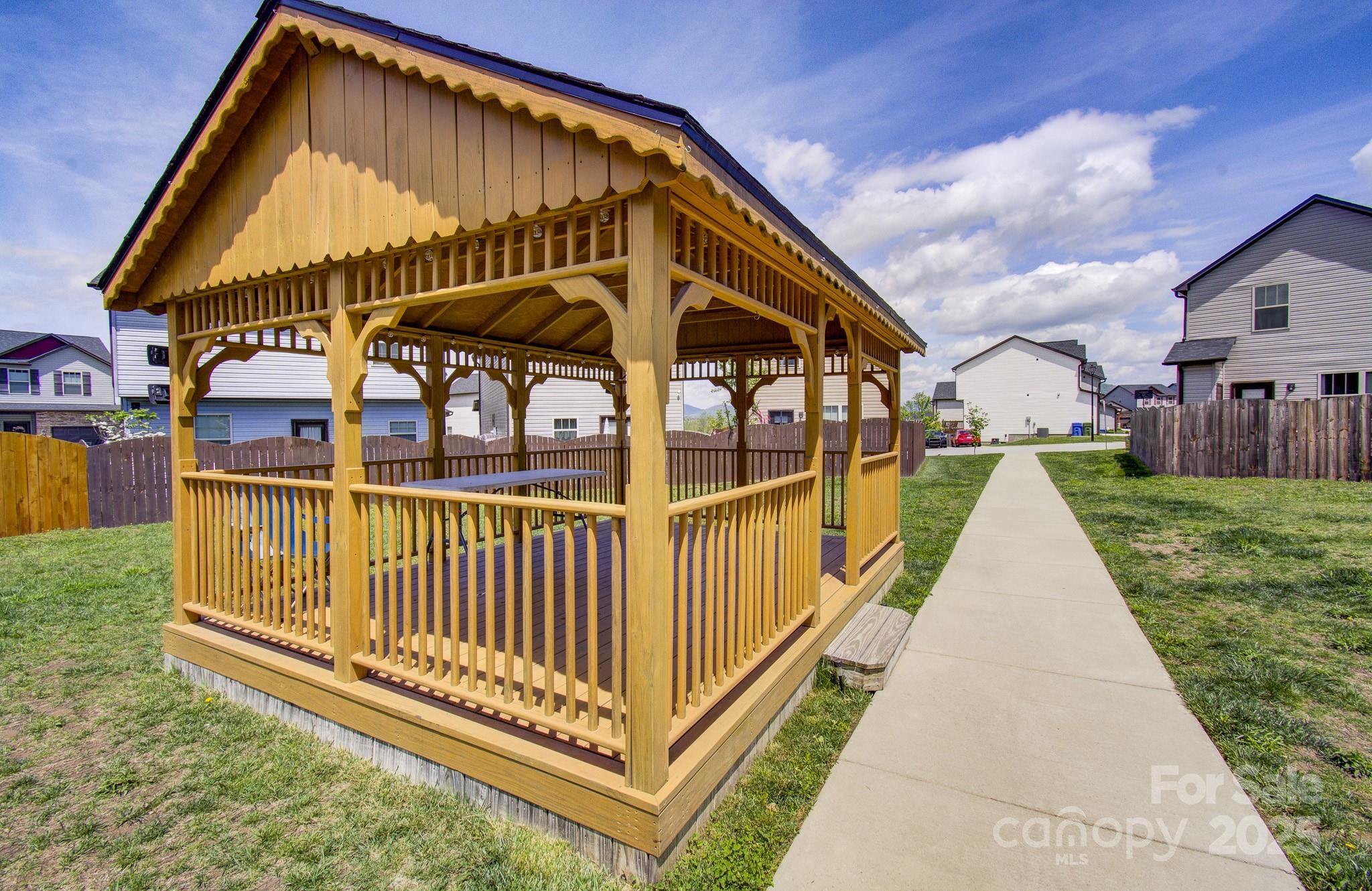 689 Cardwell Lane Fletcher, NC 28732 - Photo 38 of 39 a view of a house with backyard and deck
