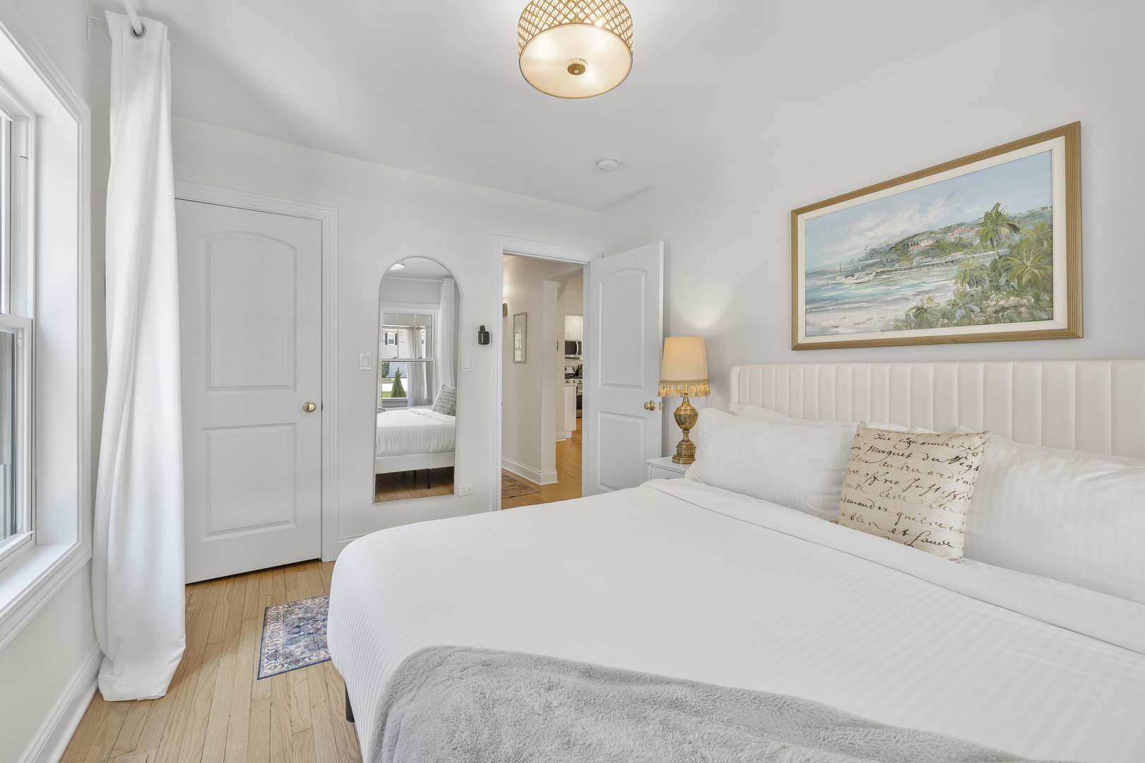 300 Geneva Road Glen Ellyn, IL 60137 - Photo 16 of 41 a bedroom with a bed and a painting on the wall