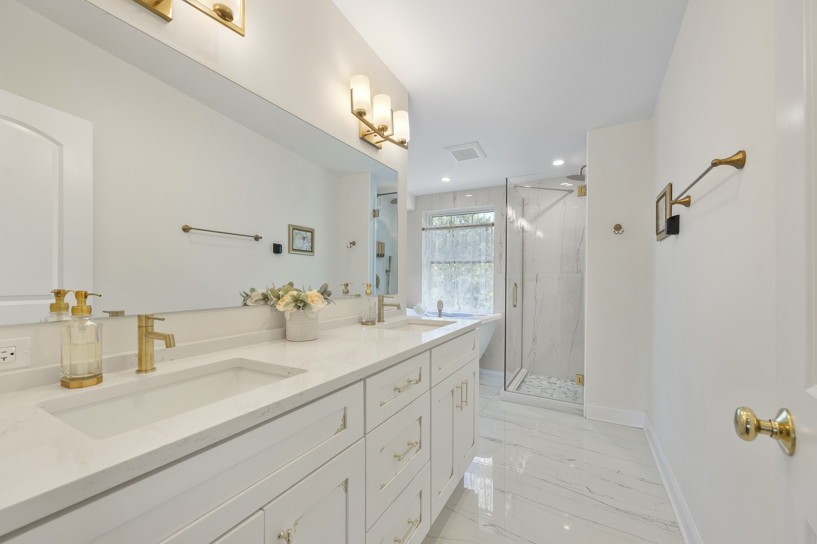 300 Geneva Road Glen Ellyn, IL 60137 - Photo 21 of 41 a bathroom with a sink and a mirror