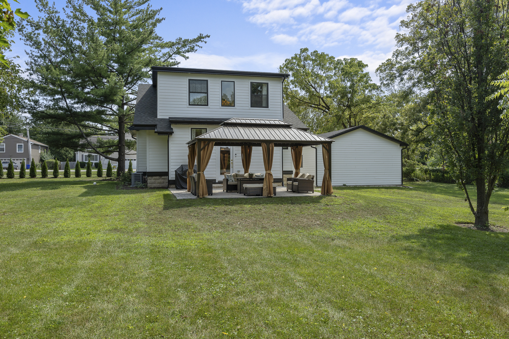 300 Geneva Road Glen Ellyn, IL 60137 - Photo 36 of 41 a front view of a house with garden