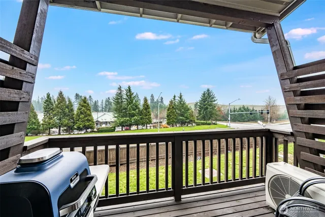 a view of balcony with furniture