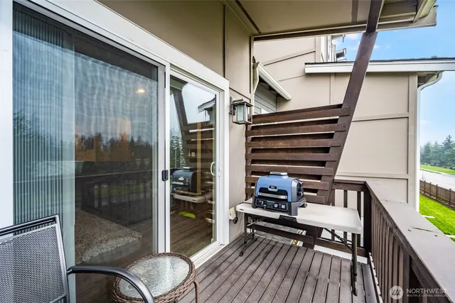 a view of balcony deck and furniture