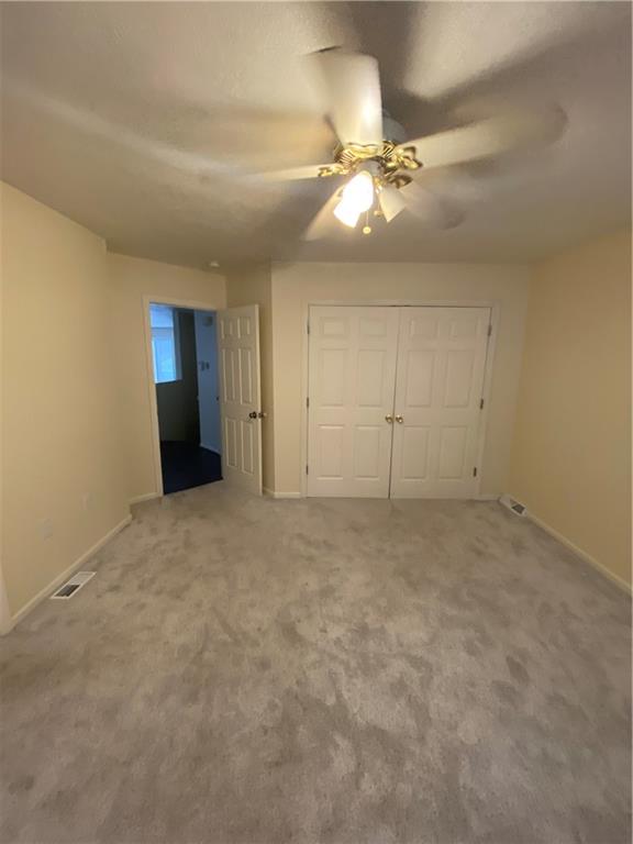 280 Old Lebanon Church Road Pittsburgh, PA 15236 - Photo 11 of 29 a view of an empty room with a chandelier fan