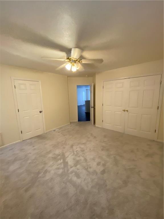280 Old Lebanon Church Road Pittsburgh, PA 15236 - Photo 12 of 29 a view of an empty room with chandelier fan
