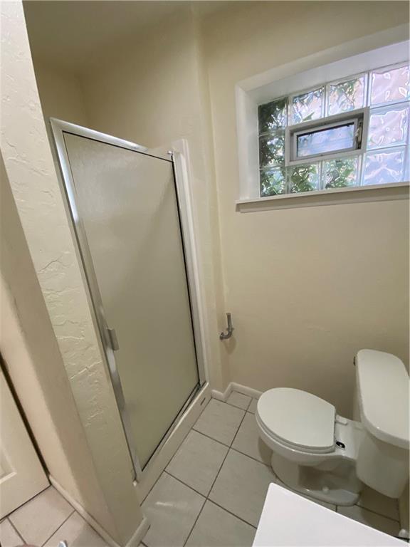 280 Old Lebanon Church Road Pittsburgh, PA 15236 - Photo 16 of 29 a white toilet sitting next to a small window