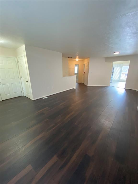280 Old Lebanon Church Road Pittsburgh, PA 15236 - Photo 3 of 29 an empty room with wooden floor and windows