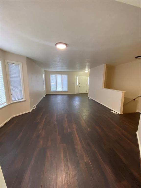 280 Old Lebanon Church Road Pittsburgh, PA 15236 - Photo 4 of 29 an empty room with wooden floor and windows