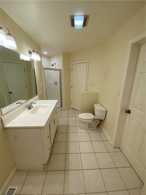 280 Old Lebanon Church Road Pittsburgh, PA 15236 - Photo 9 of 29 a bathroom with a sink a toilet and a mirror