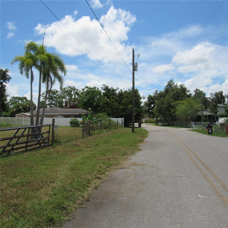 6725 Quonset Road Bradenton, FL 34203 - Photo 4 of 11 a view of a lake with a big yard