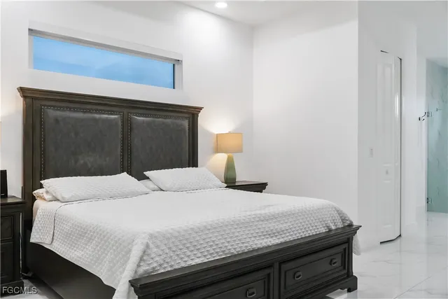 a living room with fireplace furniture and a flat screen tv