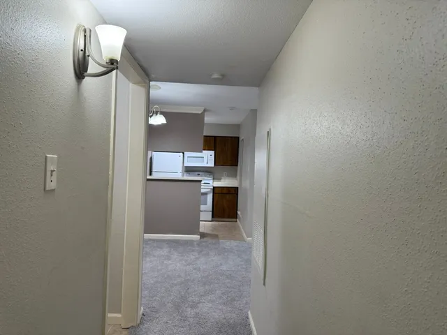 a view of a kitchen and a sink