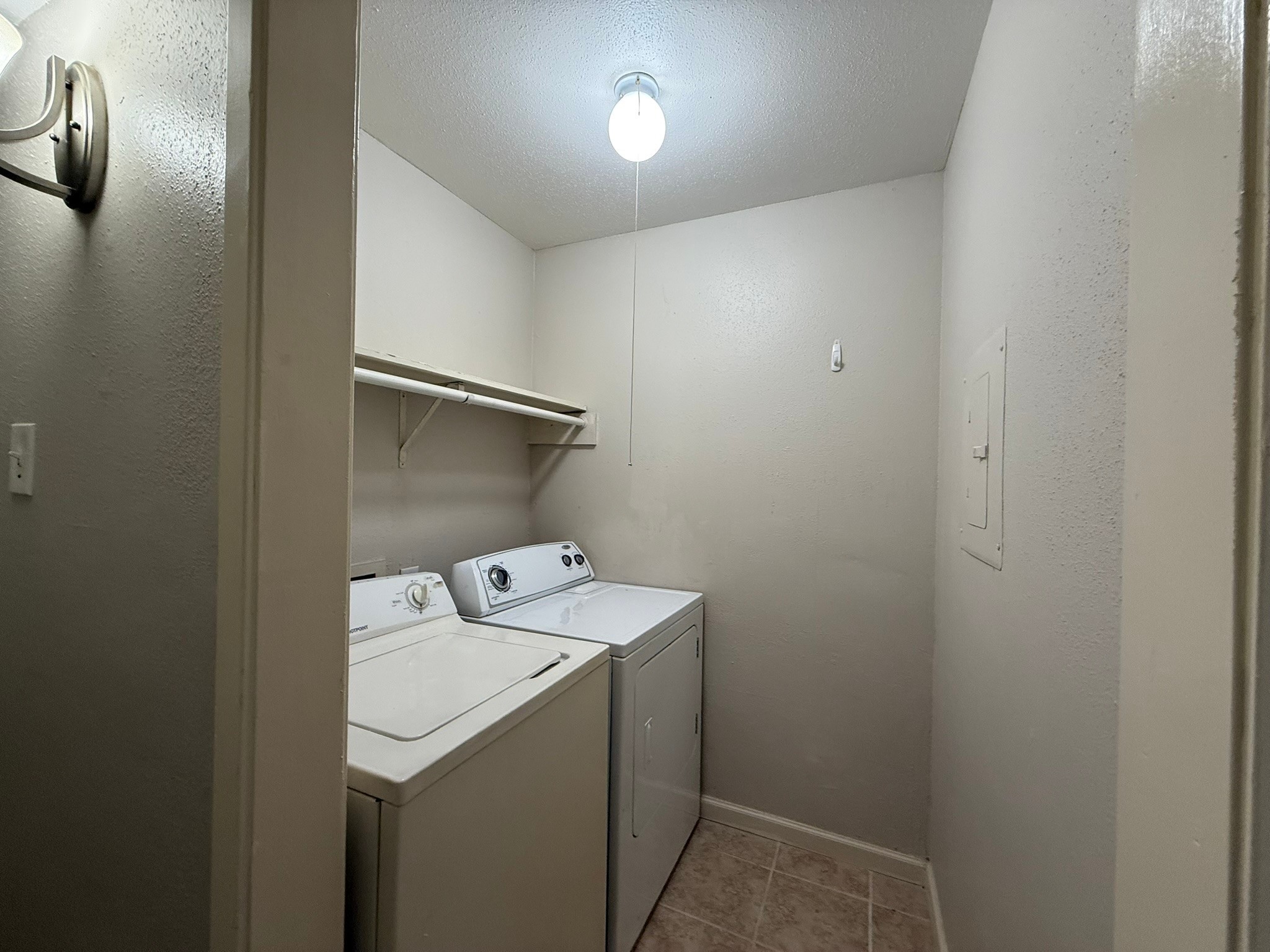 16303 Lyons School Road, Unit 315 Spring, TX 77379 - Photo 17 of 20 a utility room with dryer and washer
