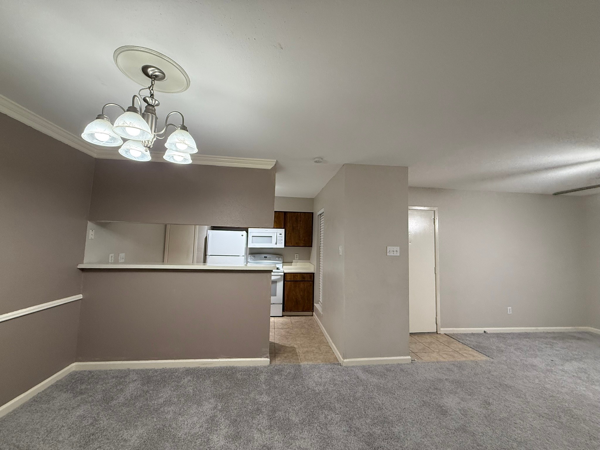16303 Lyons School Road, Unit 315 Spring, TX 77379 - Photo 18 of 20 a view of a kitchen with a window