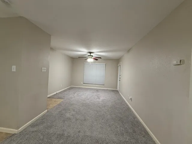 a view of balcony and yard