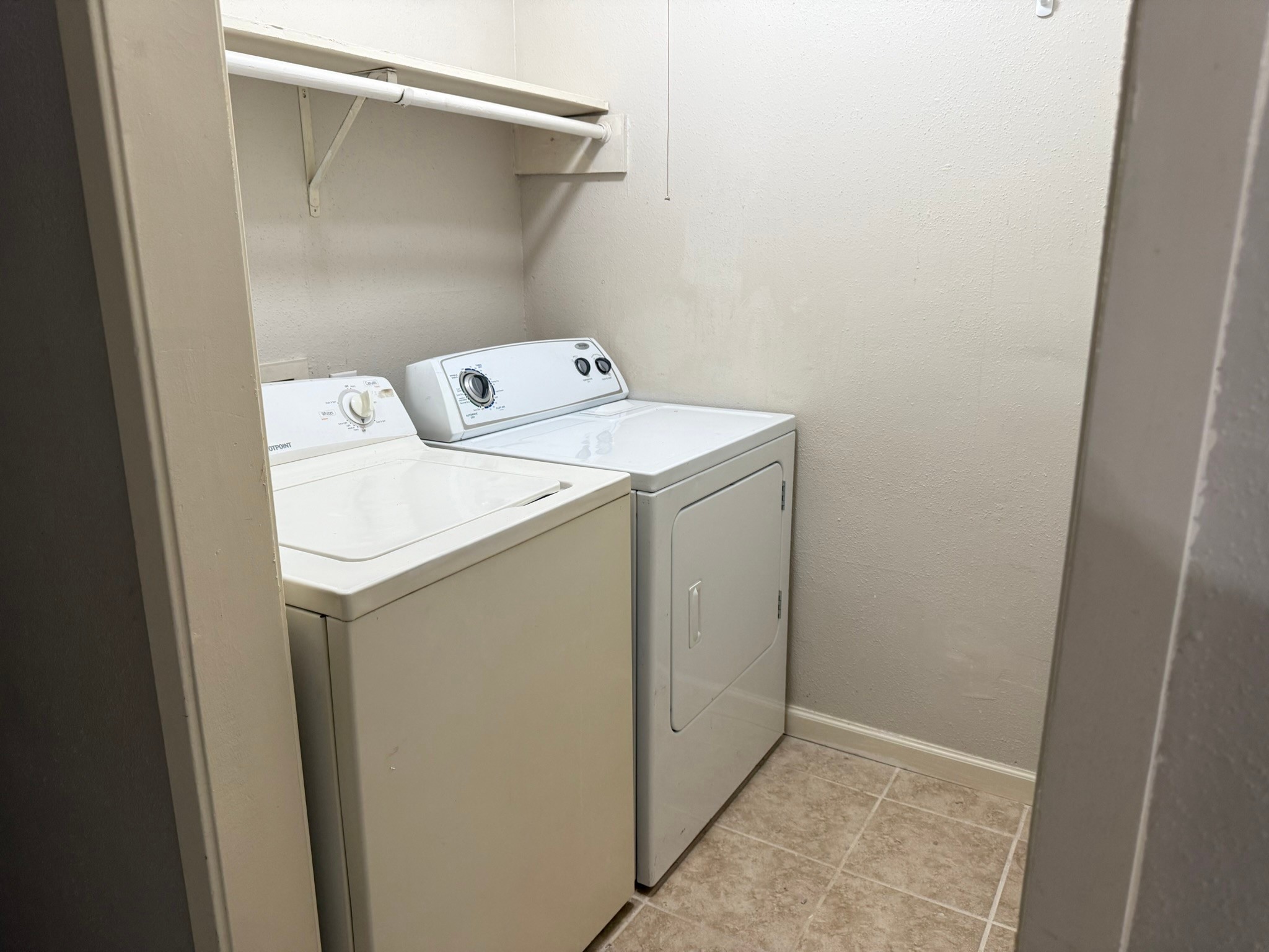 16303 Lyons School Road, Unit 315 Spring, TX 77379 - Photo 5 of 20 a utility room with dryer and washer