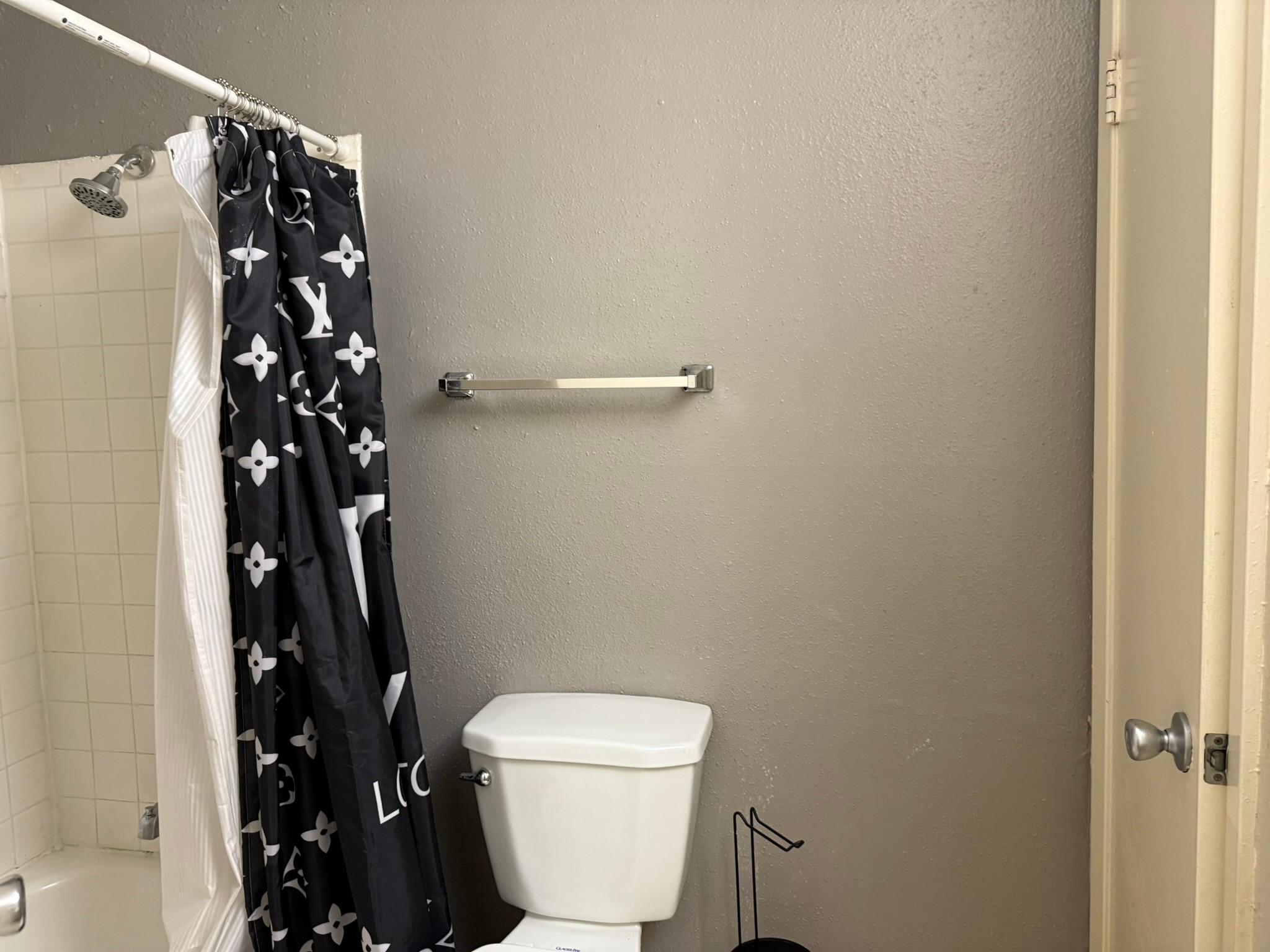 16303 Lyons School Road, Unit 315 Spring, TX 77379 - Photo 8 of 20 a bathroom with a toilet and shower