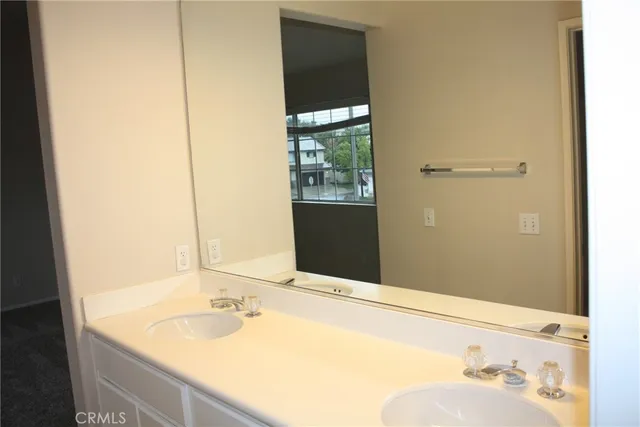 a bathroom with a bathtub and toilet