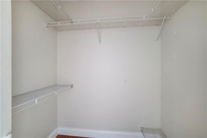 9769 Riverside Drive, Unit 712 Coral Springs, FL 33071 - Photo 12 of 18 a view of an empty walk in closet