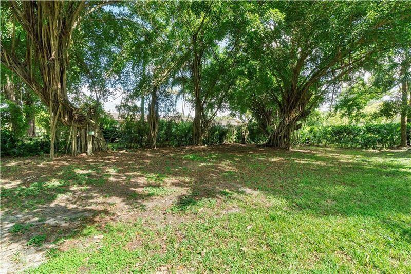 9769 Riverside Drive, Unit 712 Coral Springs, FL 33071 - Photo 17 of 18 a view of outdoor space with a garden