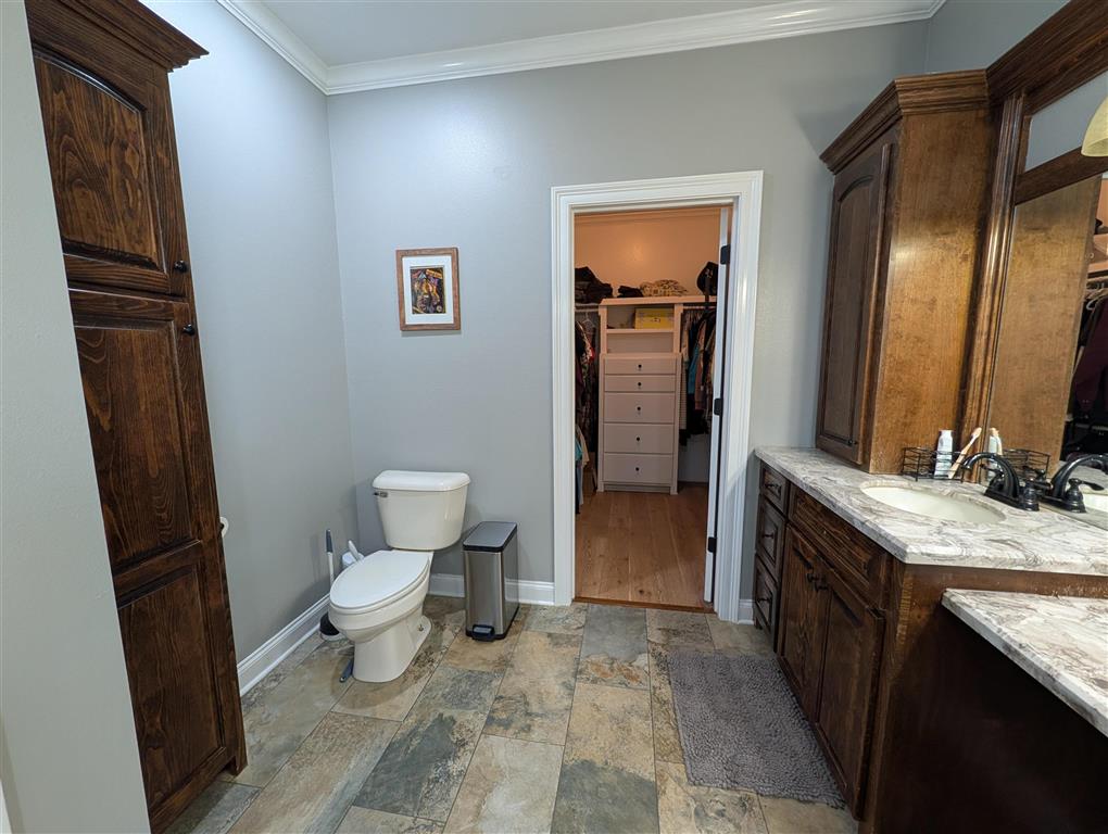 11480 Blanchard Road Welsh, LA 70591 - Photo 20 of 48 Toilet area and entrance to 2nd master closet