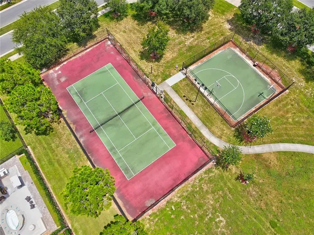 an aerial view of a tennis ground