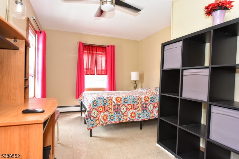 435 Northern Parkway Ridgewood, NJ 07450 - Photo 11 of 22 a bedroom with a bed and a window