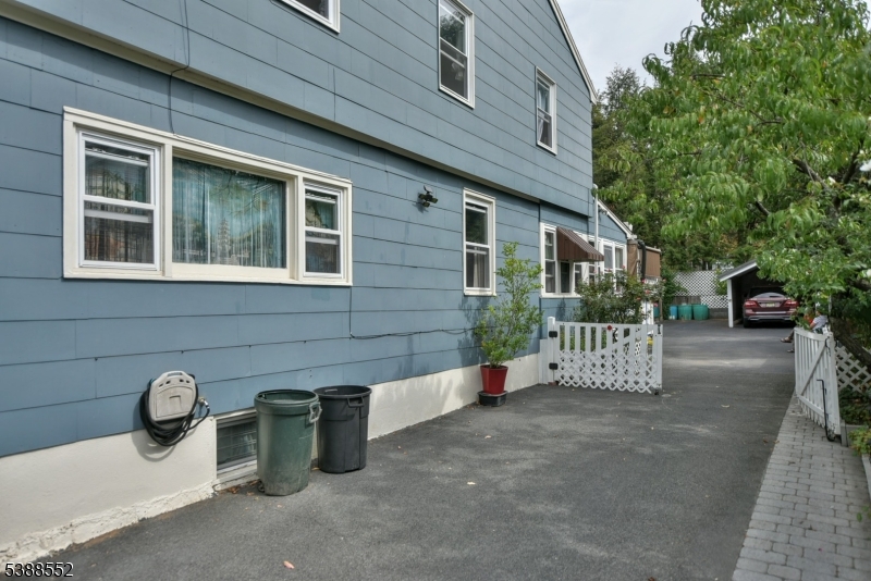 435 Northern Parkway Ridgewood, NJ 07450 - Photo 19 of 22 a view of a house with a yard