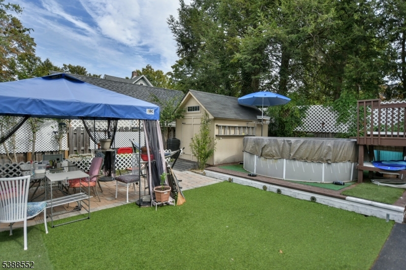 435 Northern Parkway Ridgewood, NJ 07450 - Photo 21 of 22 a view of a house with a backyard and a patio