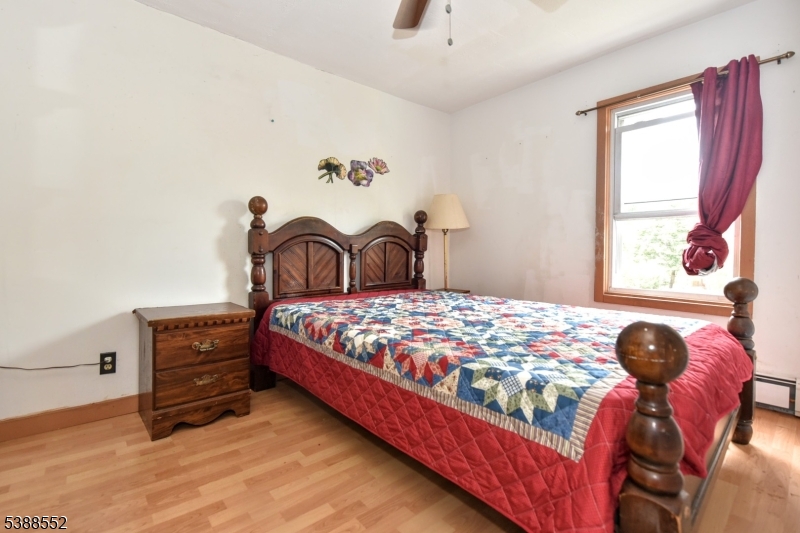 435 Northern Parkway Ridgewood, NJ 07450 - Photo 10 of 22 a bedroom with a bed and window