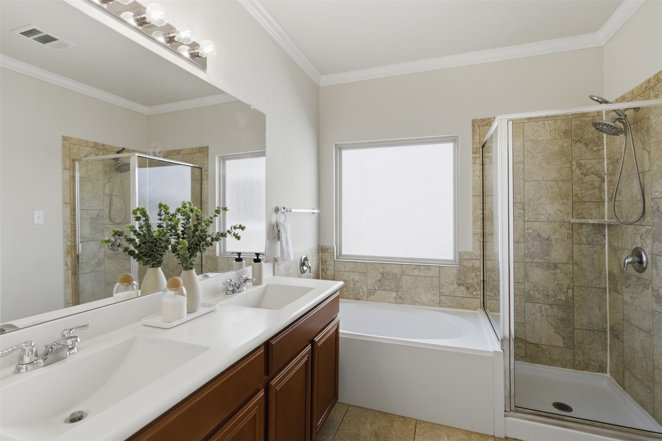 124 Golden Eagle Leander, TX 78641 - Photo 20 of 32 The primary bathroom is large enough for 2 and has both, soaking tub and walk-in shower.