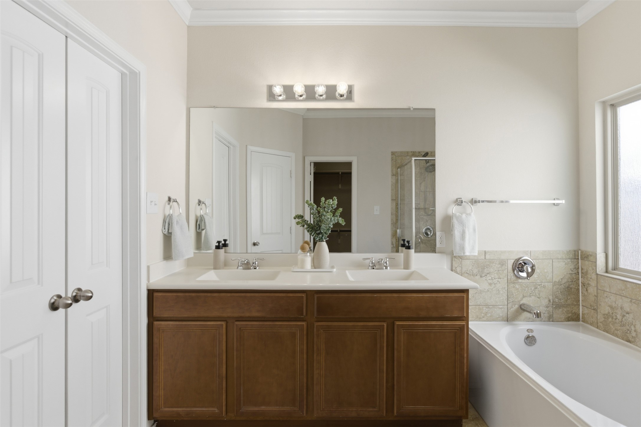124 Golden Eagle Leander, TX 78641 - Photo 21 of 32 The water closet and walk-in shower complete this primary bathroom.