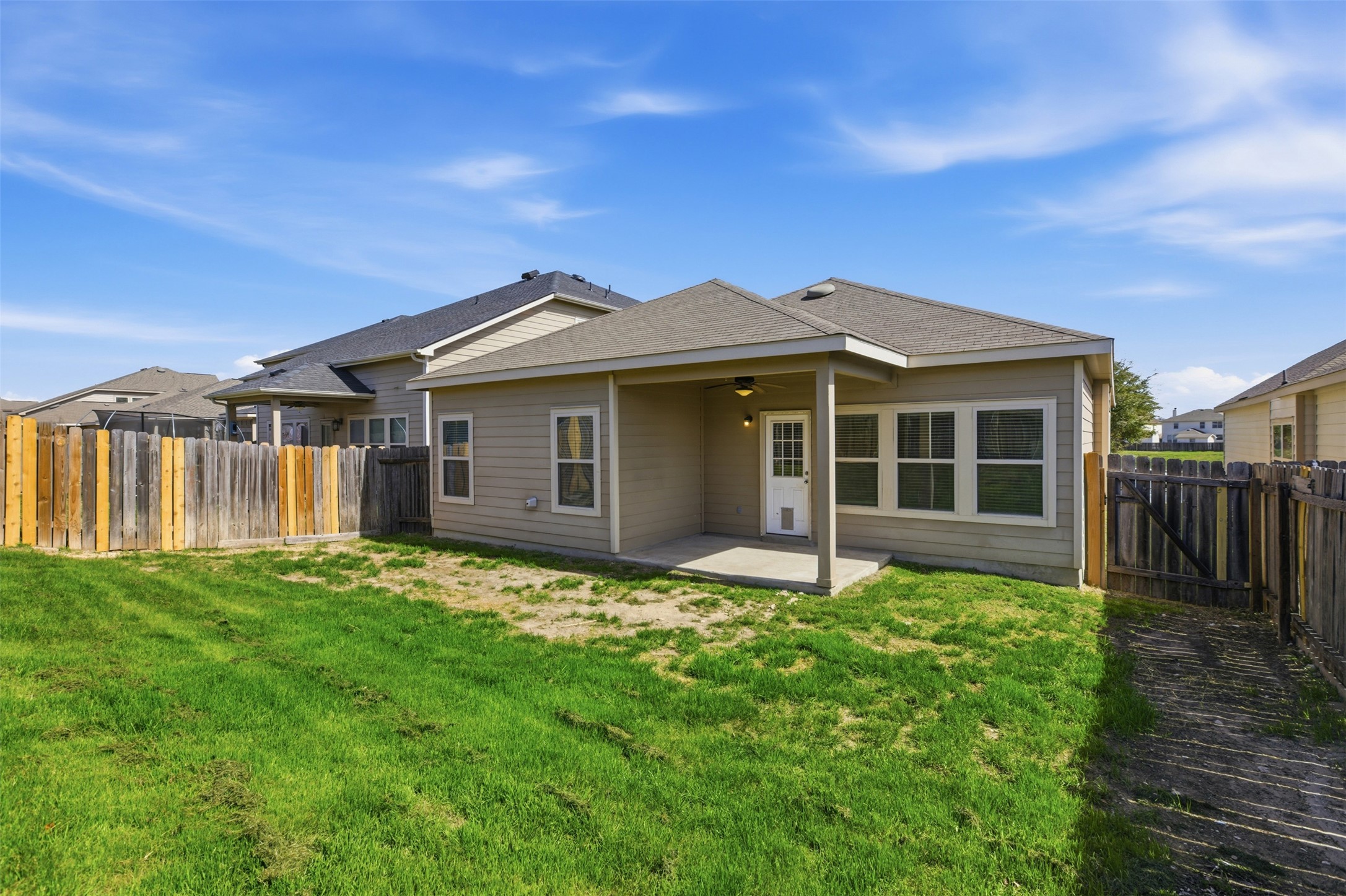 124 Golden Eagle Leander, TX 78641 - Photo 30 of 32 Back of the home and yard.